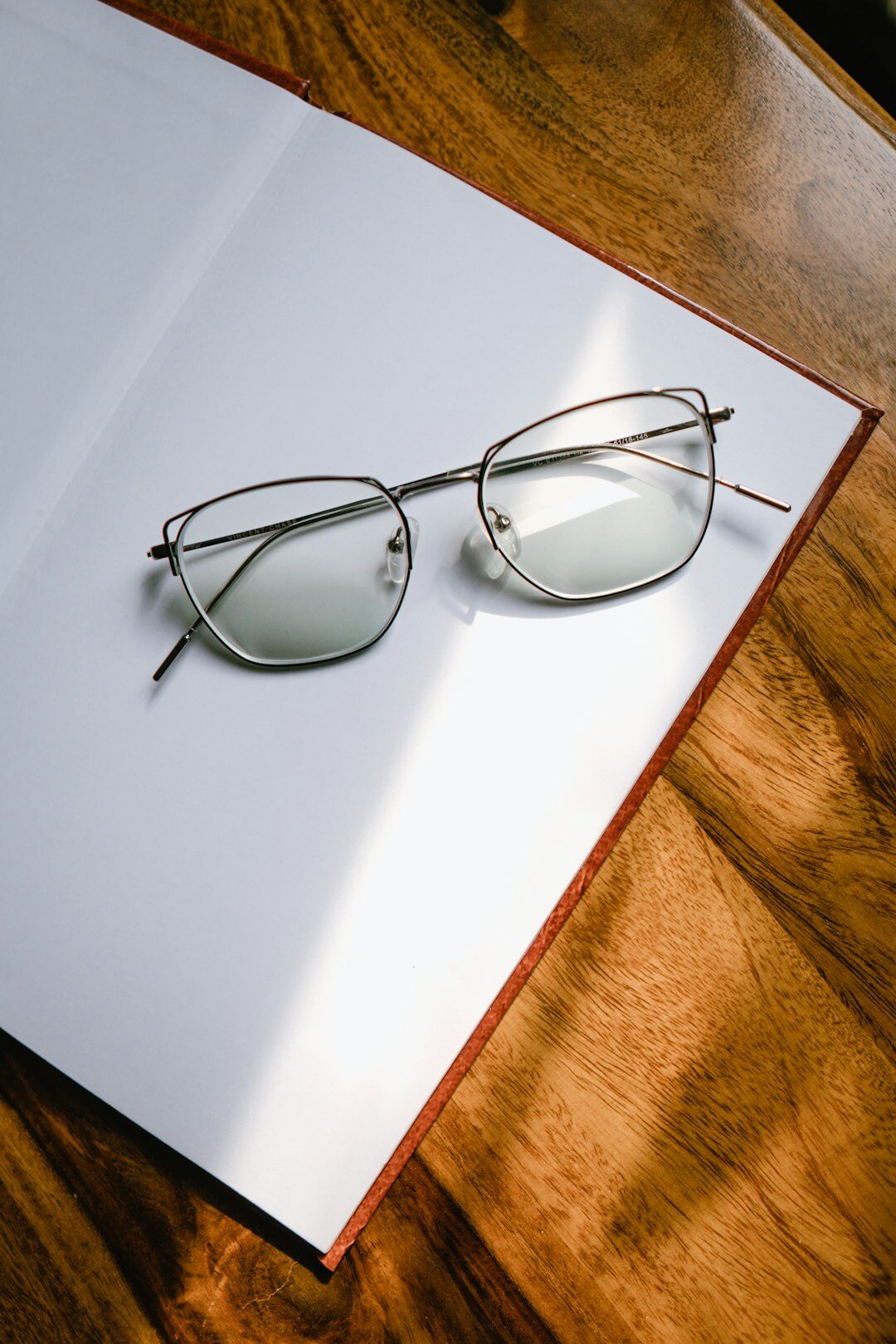 open mystery book with glasses