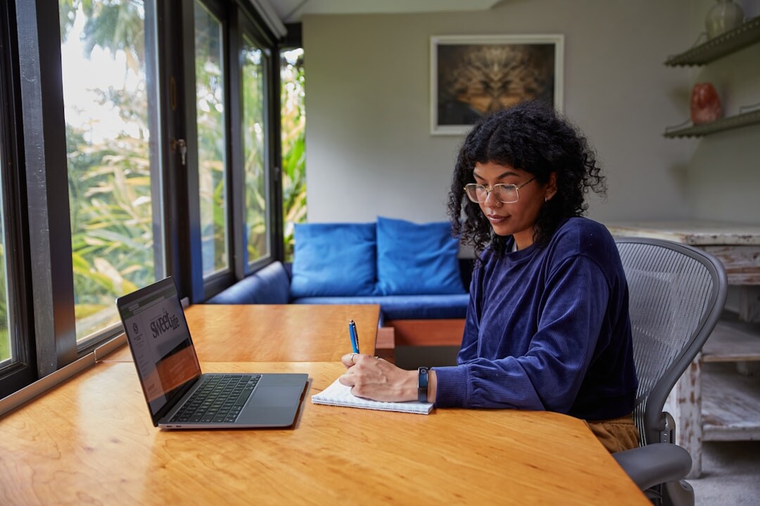 writer at desk with notebook
